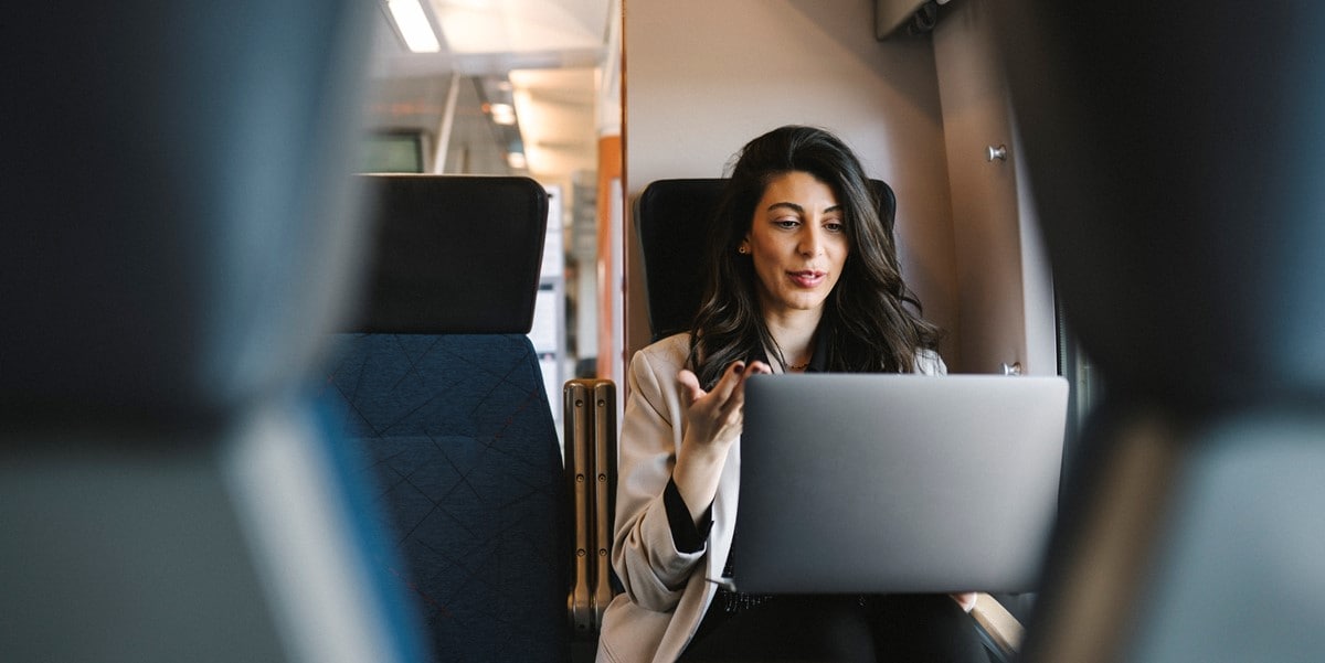 business traveler working on train