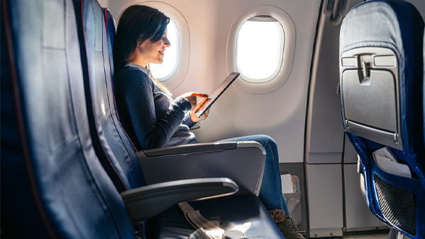 Business professional in airplane seat